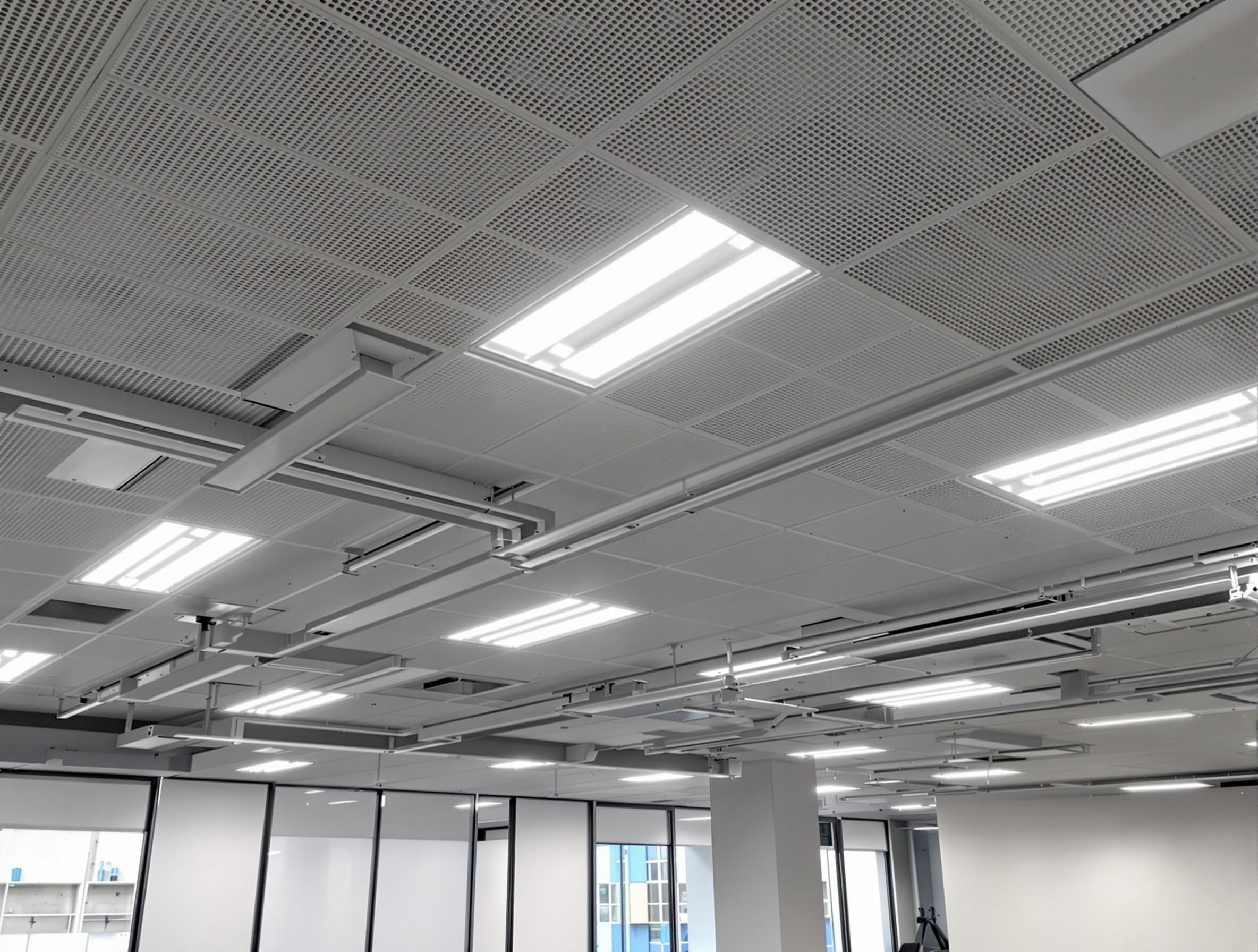 UK commercial electrical installation with trunking and LED panels