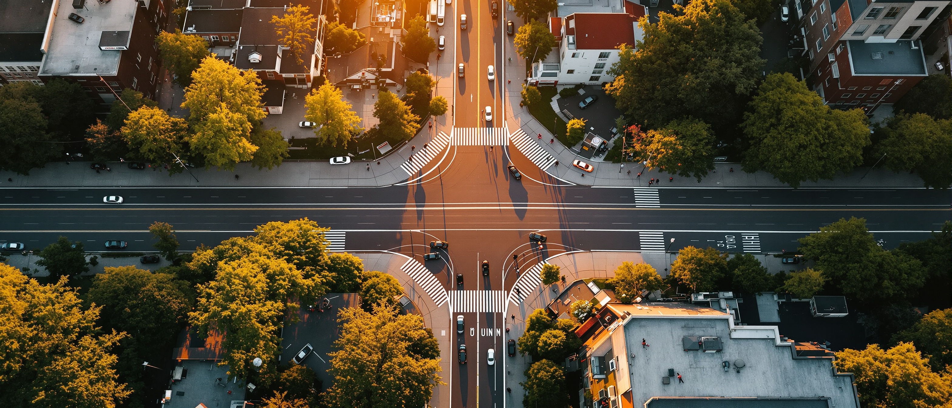 City street intersection at golden hour representing safe streets advocacy