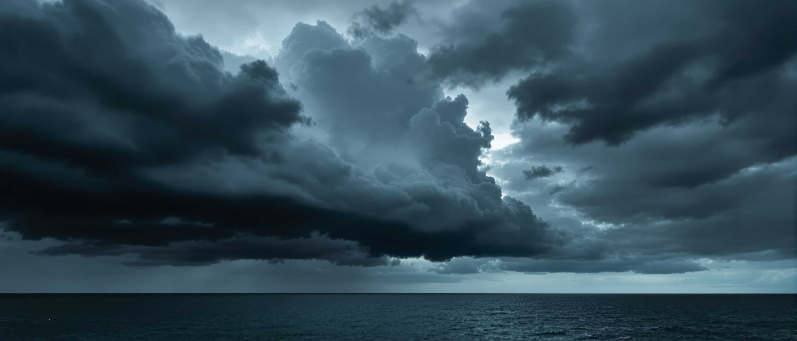 Dark storm clouds over Florida coastline