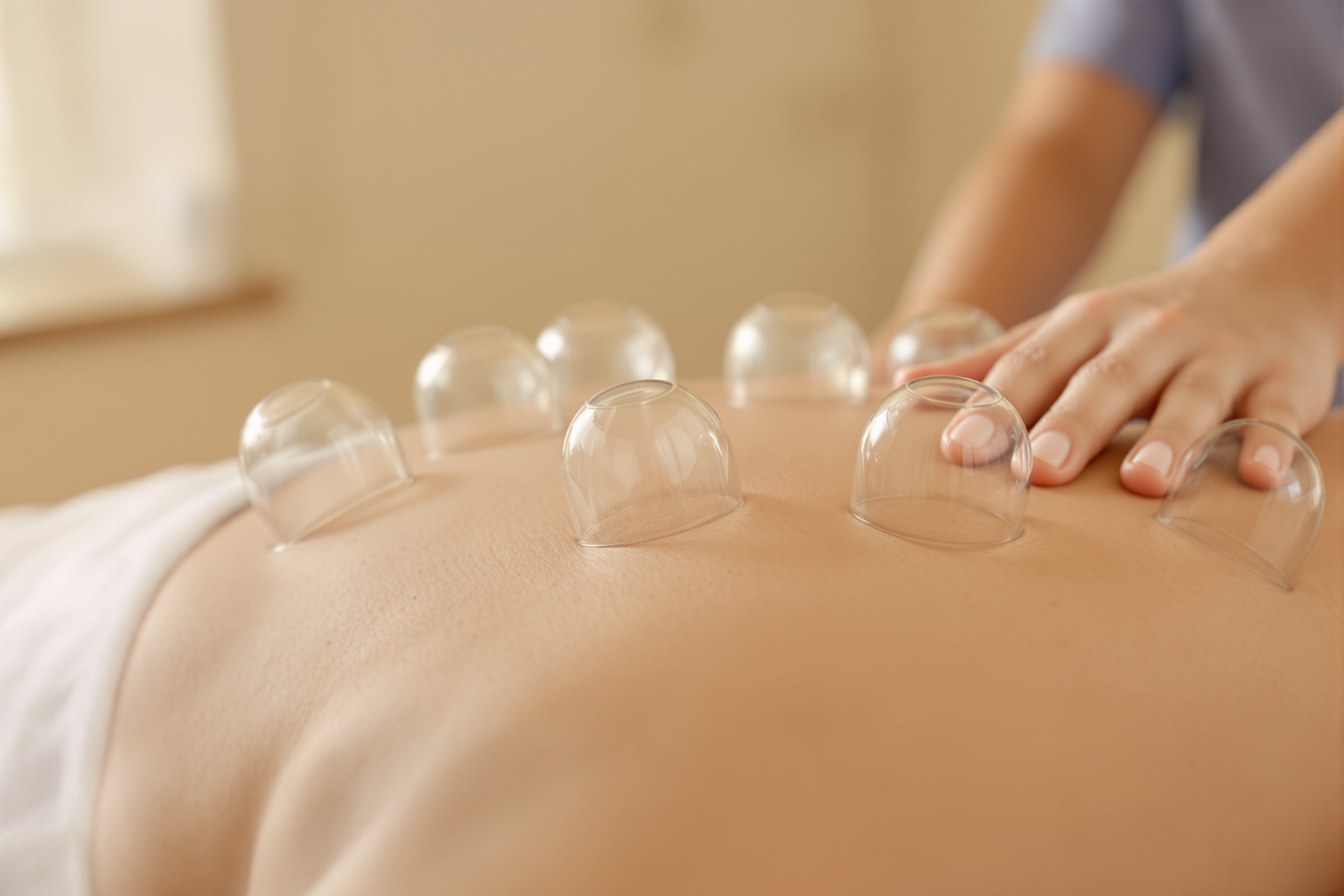 Schröpfkopf-Massage
