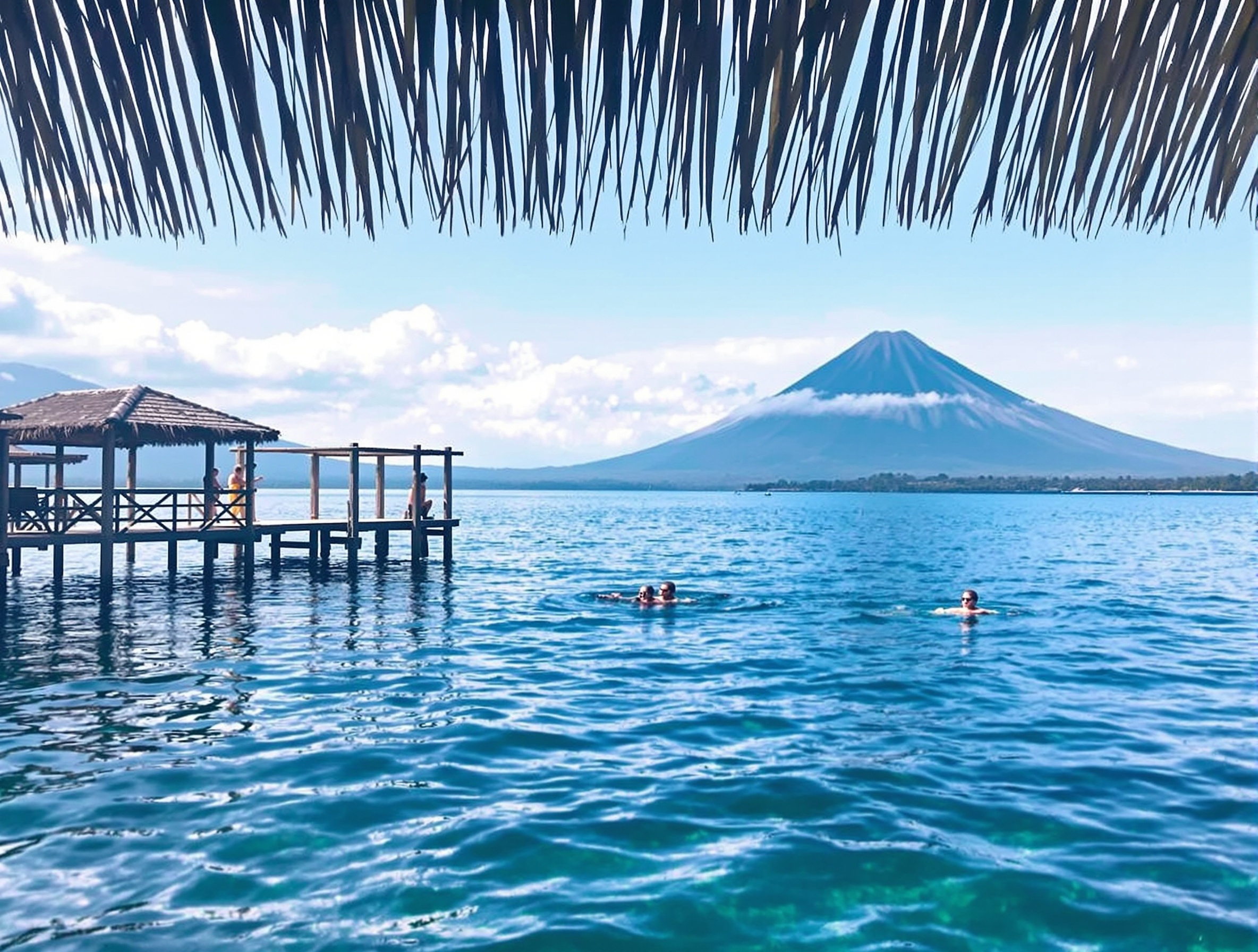 Swimming in Lake Atitlán Guatemala from a private dock with volcano views