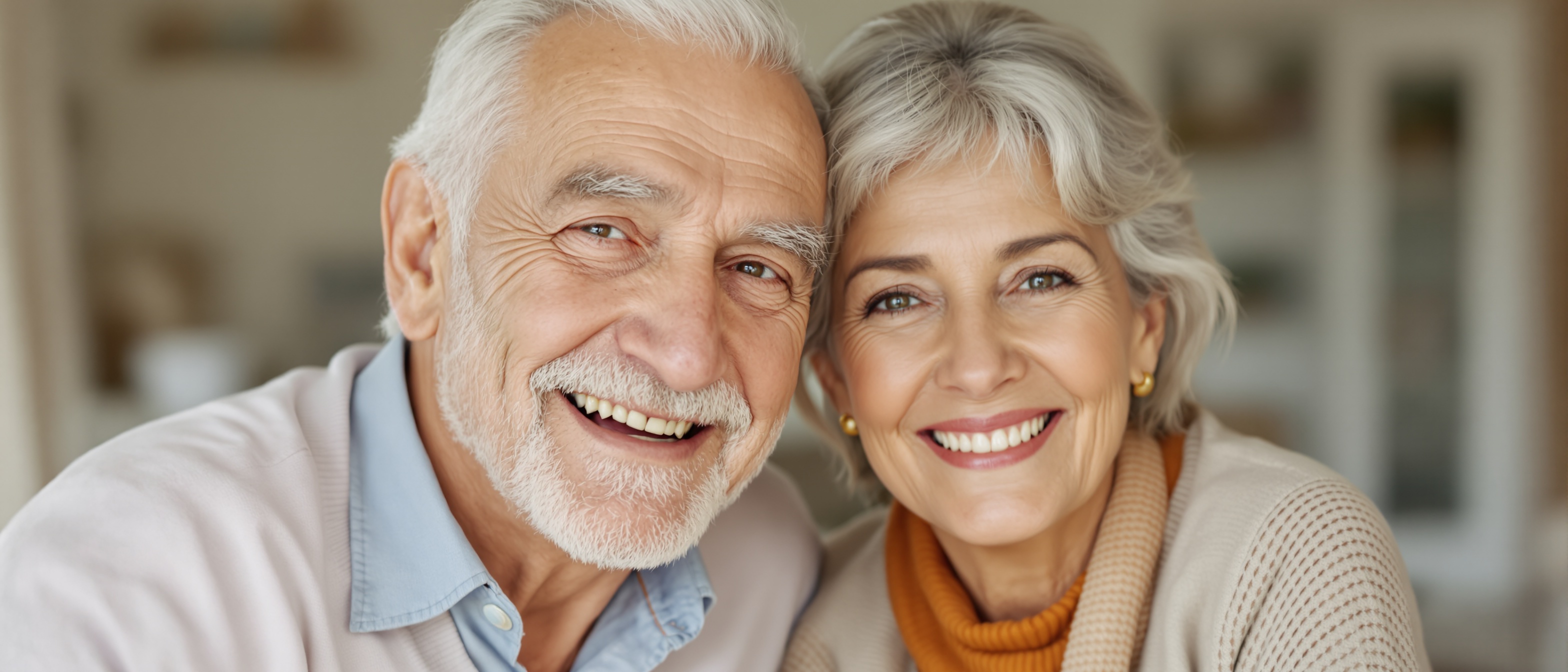 Happy elderly couple smiling