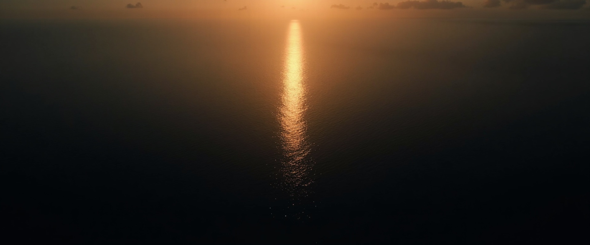 Ocean with golden light reflection