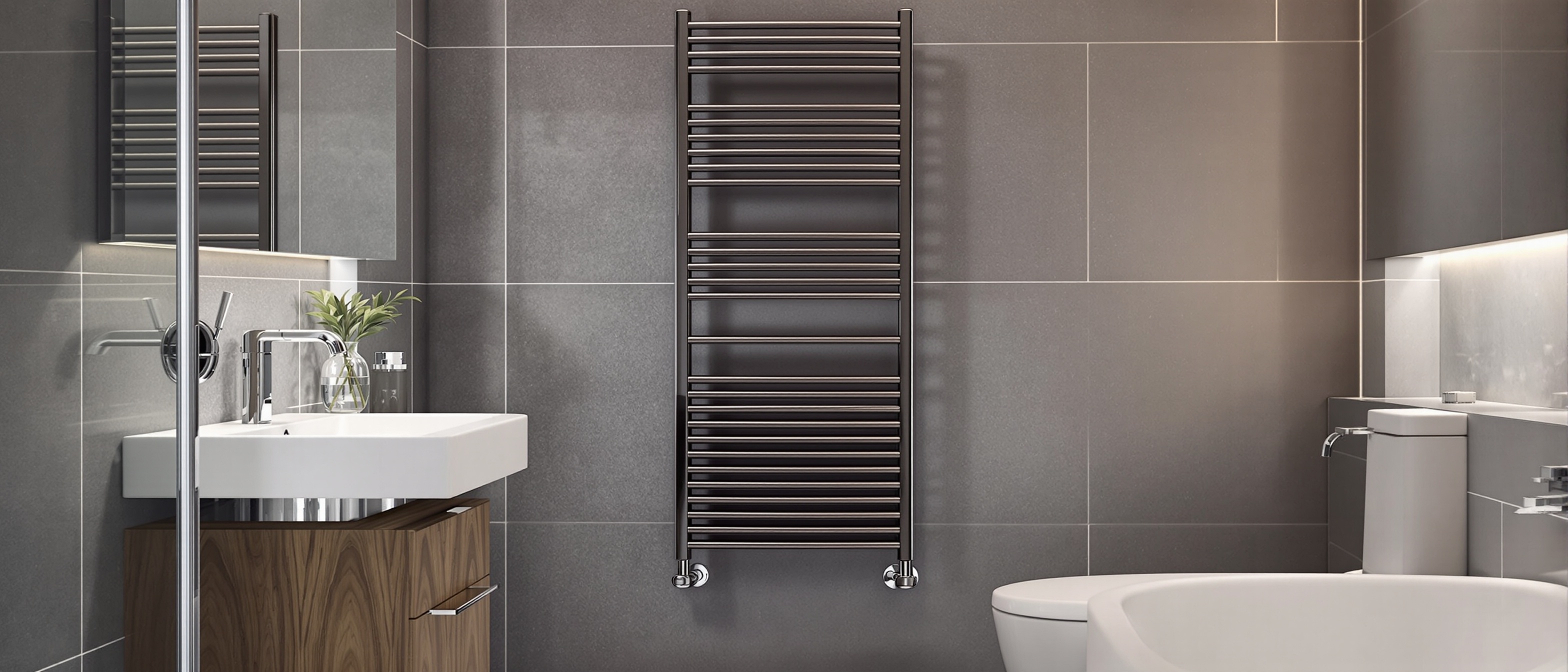 Modern heated towel rail in bathroom