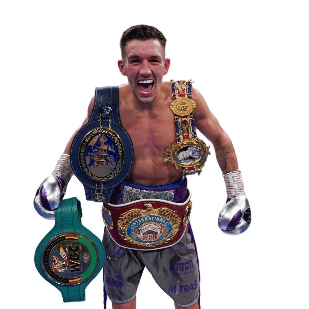 Liam Davies champion boxer with championship belts